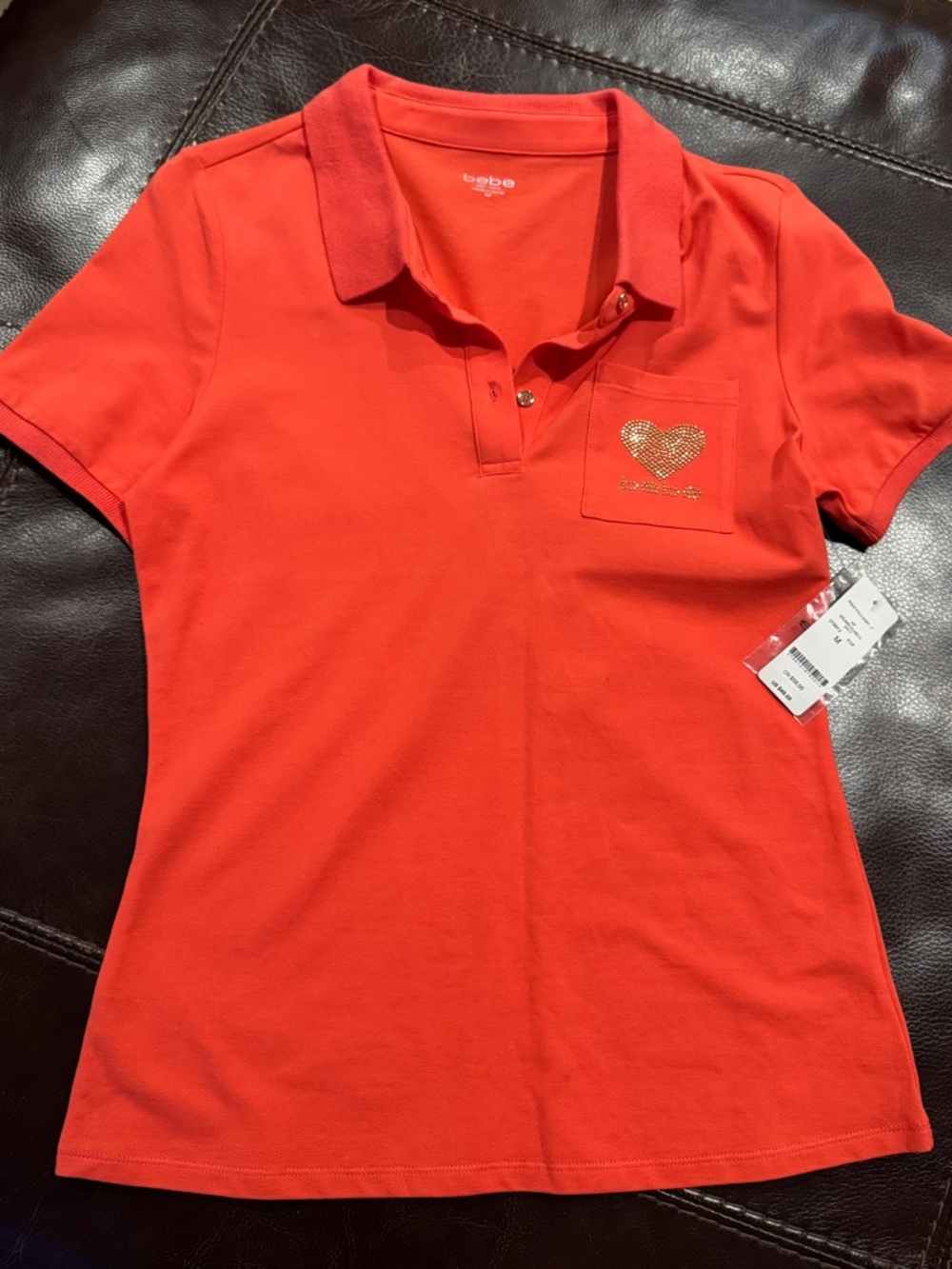 Bebe Orange polo shirt medium